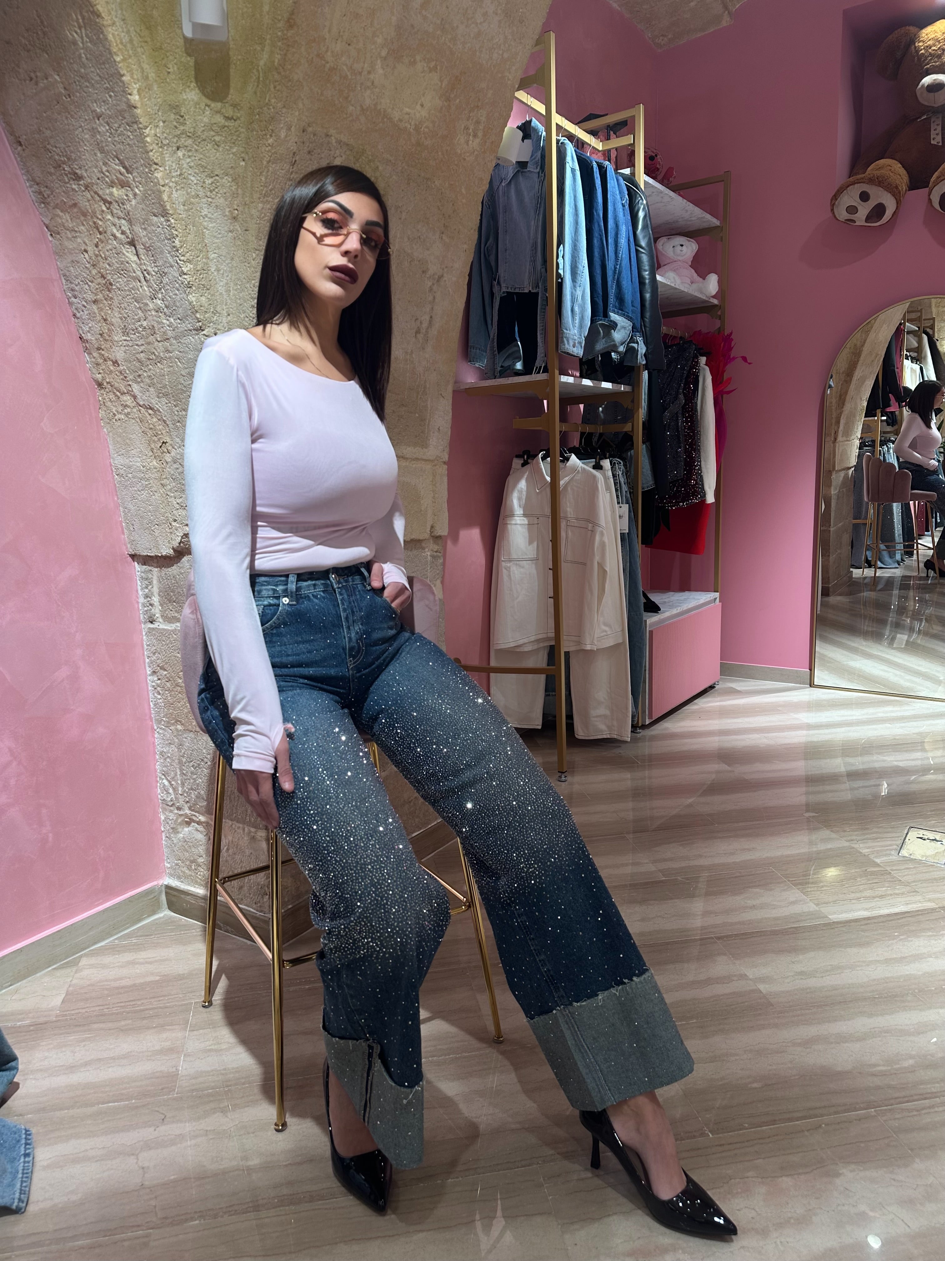 Jeans brillantinato con piegone
