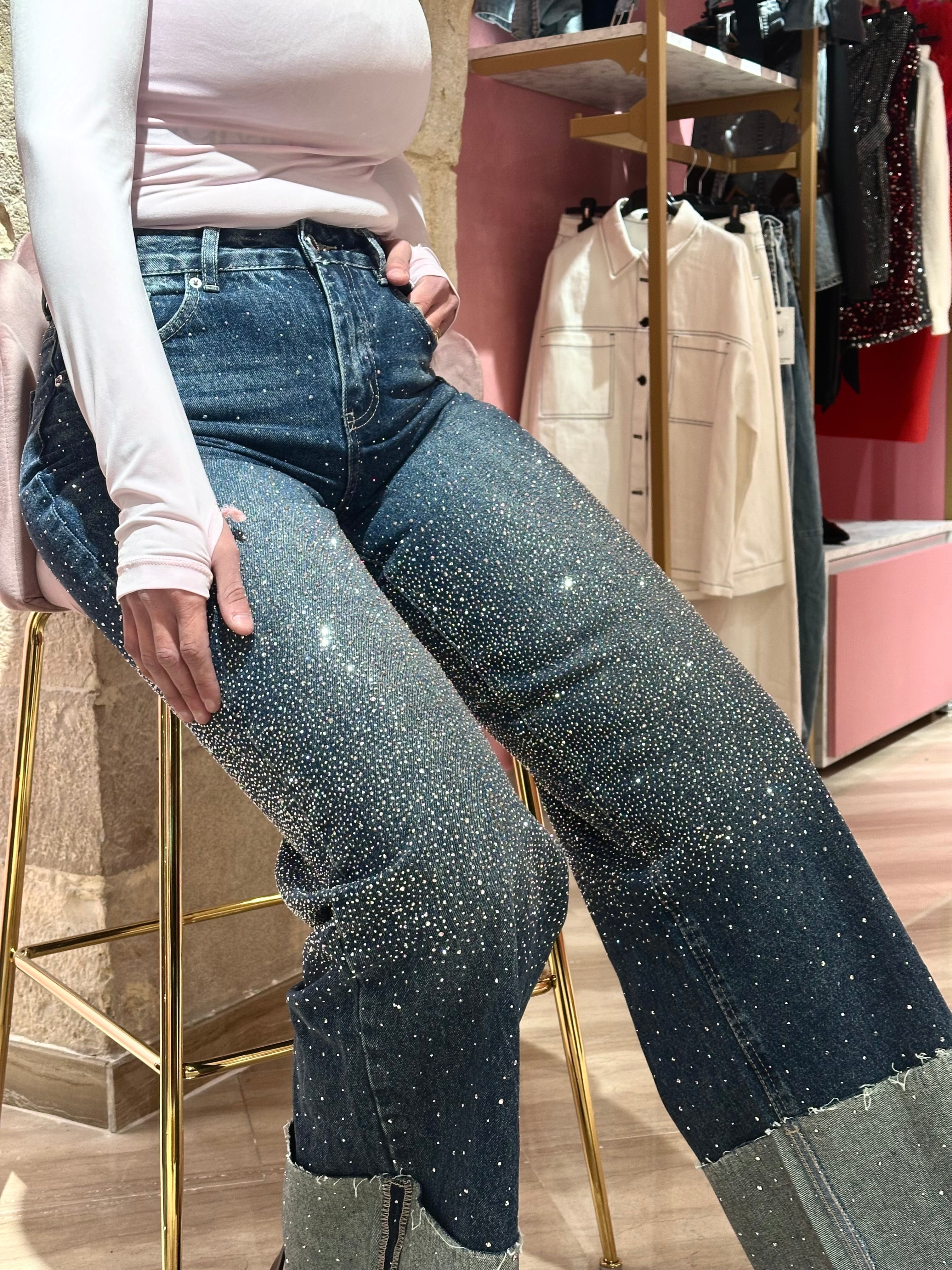 Jeans brillantinato con piegone
